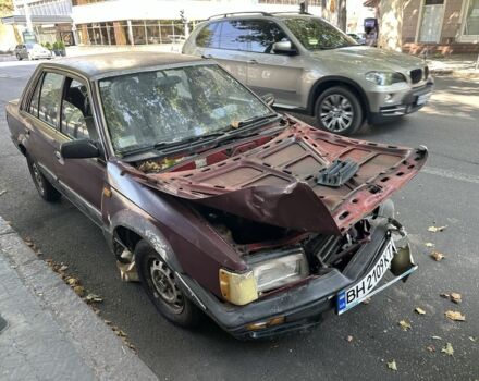 Красный Мазда 323, объемом двигателя 1.5 л и пробегом 138 тыс. км за 250 $, фото 2 на Automoto.ua