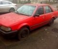 Красный Мазда 323, объемом двигателя 1.3 л и пробегом 300 тыс. км за 500 $, фото 1 на Automoto.ua