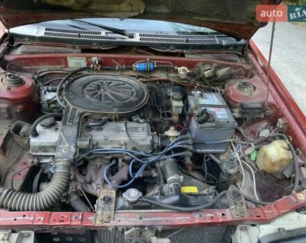Червоний Мазда 323, об'ємом двигуна 1.3 л та пробігом 450 тис. км за 950 $, фото 15 на Automoto.ua