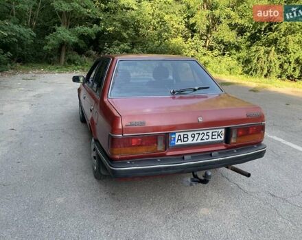 Червоний Мазда 323, об'ємом двигуна 1.3 л та пробігом 450 тис. км за 950 $, фото 3 на Automoto.ua