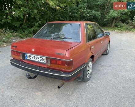 Червоний Мазда 323, об'ємом двигуна 1.3 л та пробігом 450 тис. км за 950 $, фото 4 на Automoto.ua