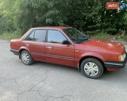 Червоний Мазда 323, об'ємом двигуна 1.3 л та пробігом 450 тис. км за 950 $, фото 7 на Automoto.ua