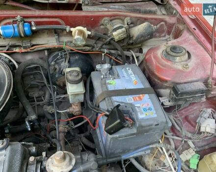 Червоний Мазда 323, об'ємом двигуна 1.3 л та пробігом 450 тис. км за 950 $, фото 17 на Automoto.ua