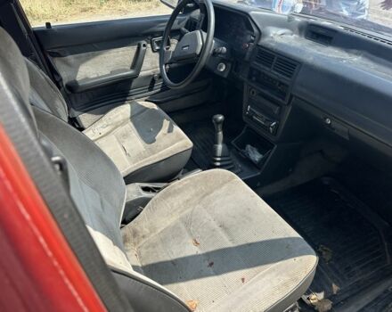 Красный Мазда 323, объемом двигателя 1.5 л и пробегом 138 тыс. км за 250 $, фото 5 на Automoto.ua