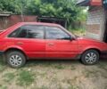 Красный Мазда 323, объемом двигателя 1 л и пробегом 70 тыс. км за 428 $, фото 1 на Automoto.ua