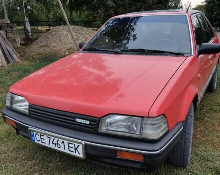 Красный Мазда 323, объемом двигателя 1.5 л и пробегом 260 тыс. км за 1450 $, фото 5 на Automoto.ua