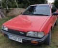 Красный Мазда 323, объемом двигателя 1.5 л и пробегом 260 тыс. км за 1450 $, фото 5 на Automoto.ua