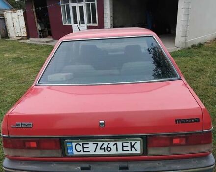 Красный Мазда 323, объемом двигателя 1.5 л и пробегом 260 тыс. км за 1450 $, фото 3 на Automoto.ua