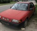 Красный Мазда 323, объемом двигателя 1.7 л и пробегом 323 тыс. км за 700 $, фото 1 на Automoto.ua