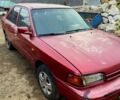 Червоний Мазда 323, об'ємом двигуна 1.8 л та пробігом 200 тис. км за 750 $, фото 1 на Automoto.ua