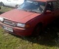 Красный Мазда 323, объемом двигателя 1.6 л и пробегом 500 тыс. км за 350 $, фото 1 на Automoto.ua