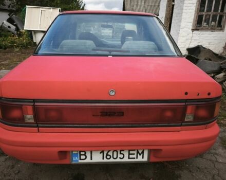 Красный Мазда 323, объемом двигателя 1.6 л и пробегом 500 тыс. км за 400 $, фото 4 на Automoto.ua