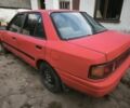 Красный Мазда 323, объемом двигателя 1.6 л и пробегом 500 тыс. км за 400 $, фото 3 на Automoto.ua