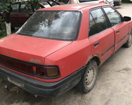Червоний Мазда 323, об'ємом двигуна 1.7 л та пробігом 300 тис. км за 700 $, фото 2 на Automoto.ua