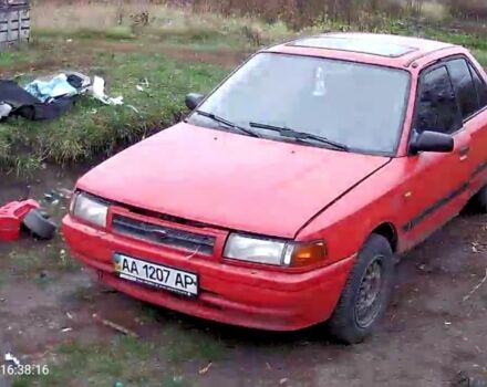 Красный Мазда 323, объемом двигателя 2 л и пробегом 4 тыс. км за 904 $, фото 2 на Automoto.ua