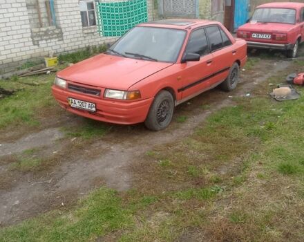 Красный Мазда 323, объемом двигателя 2 л и пробегом 4 тыс. км за 904 $, фото 1 на Automoto.ua