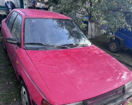 Червоний Мазда 323, об'ємом двигуна 1.4 л та пробігом 300 тис. км за 785 $, фото 2 на Automoto.ua