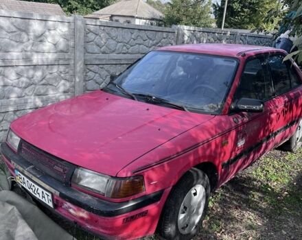 Червоний Мазда 323, об'ємом двигуна 1.4 л та пробігом 300 тис. км за 785 $, фото 4 на Automoto.ua