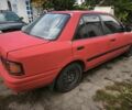 Красный Мазда 323, объемом двигателя 1.6 л и пробегом 500 тыс. км за 400 $, фото 1 на Automoto.ua