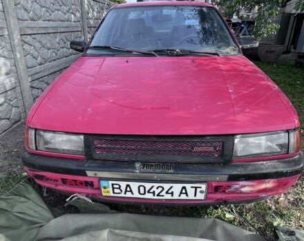 Червоний Мазда 323, об'ємом двигуна 1.4 л та пробігом 300 тис. км за 785 $, фото 3 на Automoto.ua