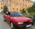 Красный Мазда 323, объемом двигателя 2 л и пробегом 265 тыс. км за 2200 $, фото 1 на Automoto.ua
