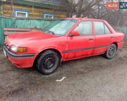 Красный Мазда 323, объемом двигателя 1.7 л и пробегом 270 тыс. км за 700 $, фото 2 на Automoto.ua