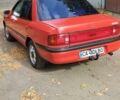 Красный Мазда 323, объемом двигателя 1.3 л и пробегом 300 тыс. км за 1850 $, фото 1 на Automoto.ua