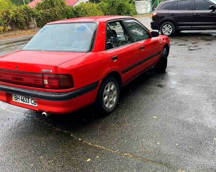Красный Мазда 323, объемом двигателя 1.6 л и пробегом 240 тыс. км за 1200 $, фото 1 на Automoto.ua