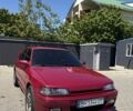Красный Мазда 323, объемом двигателя 1.7 л и пробегом 300 тыс. км за 2400 $, фото 1 на Automoto.ua
