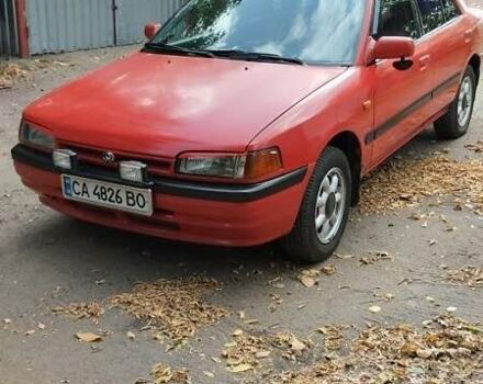 Красный Мазда 323, объемом двигателя 1.3 л и пробегом 300 тыс. км за 1850 $, фото 1 на Automoto.ua