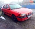Красный Мазда 323, объемом двигателя 1.7 л и пробегом 270 тыс. км за 700 $, фото 1 на Automoto.ua