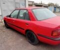 Красный Мазда 323, объемом двигателя 1.6 л и пробегом 260 тыс. км за 1000 $, фото 2 на Automoto.ua