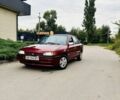 Красный Мазда 323, объемом двигателя 1.7 л и пробегом 2 тыс. км за 948 $, фото 1 на Automoto.ua