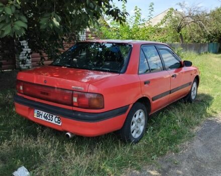 Красный Мазда 323, объемом двигателя 0 л и пробегом 333 тыс. км за 1200 $, фото 1 на Automoto.ua