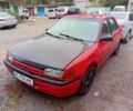Красный Мазда 323, объемом двигателя 1.6 л и пробегом 260 тыс. км за 1000 $, фото 1 на Automoto.ua