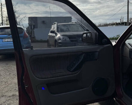 Красный Мазда 323, объемом двигателя 1.6 л и пробегом 350 тыс. км за 1200 $, фото 14 на Automoto.ua