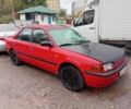 Красный Мазда 323, объемом двигателя 1.6 л и пробегом 260 тыс. км за 1000 $, фото 1 на Automoto.ua