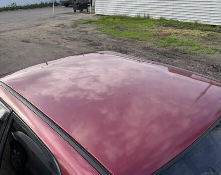 Красный Мазда 323, объемом двигателя 1.6 л и пробегом 350 тыс. км за 1200 $, фото 5 на Automoto.ua