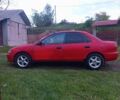 Красный Мазда 323, объемом двигателя 1.3 л и пробегом 344 тыс. км за 1300 $, фото 1 на Automoto.ua
