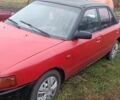 Красный Мазда 323, объемом двигателя 1.3 л и пробегом 300 тыс. км за 475 $, фото 1 на Automoto.ua