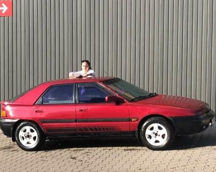 Красный Мазда 323, объемом двигателя 1.6 л и пробегом 429 тыс. км за 1900 $, фото 1 на Automoto.ua