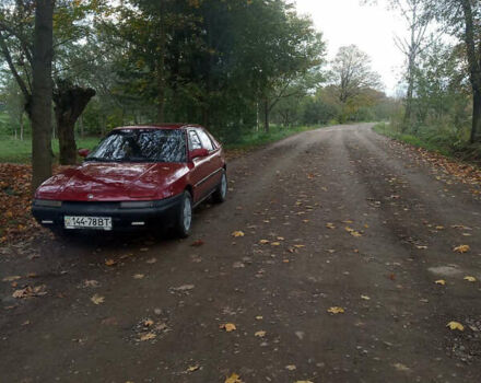 Красный Мазда 323, объемом двигателя 1.6 л и пробегом 429 тыс. км за 1900 $, фото 3 на Automoto.ua