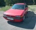 Червоний Мазда 323, об'ємом двигуна 1.7 л та пробігом 400 тис. км за 1200 $, фото 1 на Automoto.ua