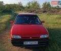 Красный Мазда 323, объемом двигателя 1.7 л и пробегом 248 тыс. км за 1500 $, фото 1 на Automoto.ua