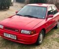 Красный Мазда 323, объемом двигателя 1.3 л и пробегом 105 тыс. км за 2500 $, фото 1 на Automoto.ua