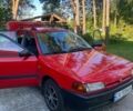 Красный Мазда 323, объемом двигателя 1.6 л и пробегом 220 тыс. км за 1800 $, фото 1 на Automoto.ua