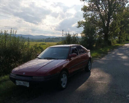 Красный Мазда 323, объемом двигателя 1.6 л и пробегом 429 тыс. км за 1900 $, фото 2 на Automoto.ua