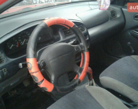 Червоний Мазда 323, об'ємом двигуна 1.5 л та пробігом 255 тис. км за 2500 $, фото 4 на Automoto.ua