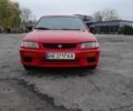 Червоний Мазда 323, об'ємом двигуна 1.5 л та пробігом 290 тис. км за 2800 $, фото 1 на Automoto.ua