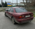 Червоний Мазда 323, об'ємом двигуна 1.49 л та пробігом 400 тис. км за 1100 $, фото 2 на Automoto.ua